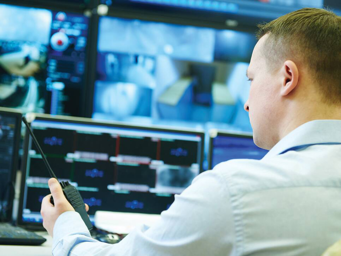 A security officer monitoring cctv footage